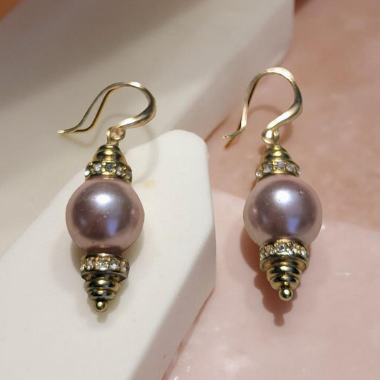 Violet pearl earrings surrounded by gold and tiny CZ's