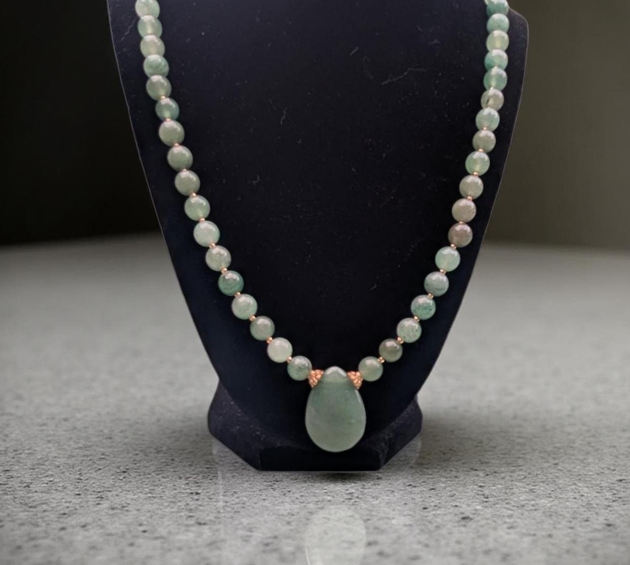 Jade Necklace, vibrant green rounded beads with a jade teardrop focal. A must-have for Jade lovers.