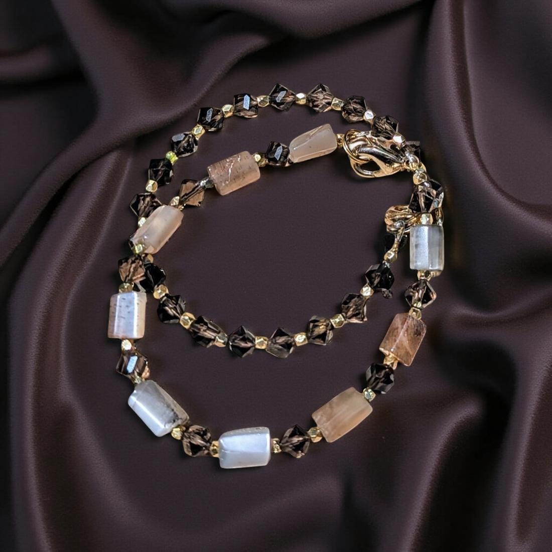 Smoky Topaz bracelet. The topaz beads are faceted interspersed with faceted gold beads for extra sparkle.