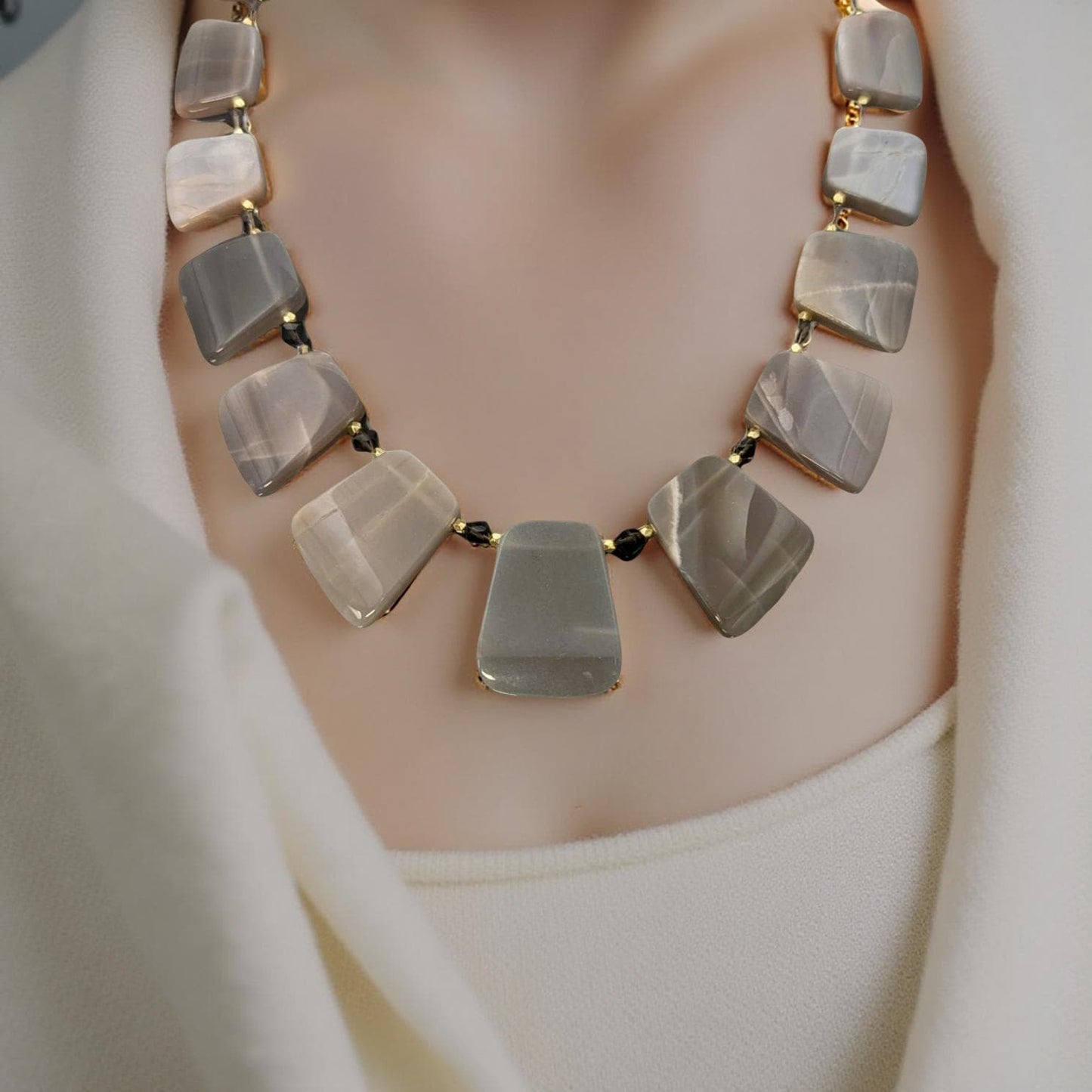 Taupe moon stone necklace accented with smoky topaz and gold.