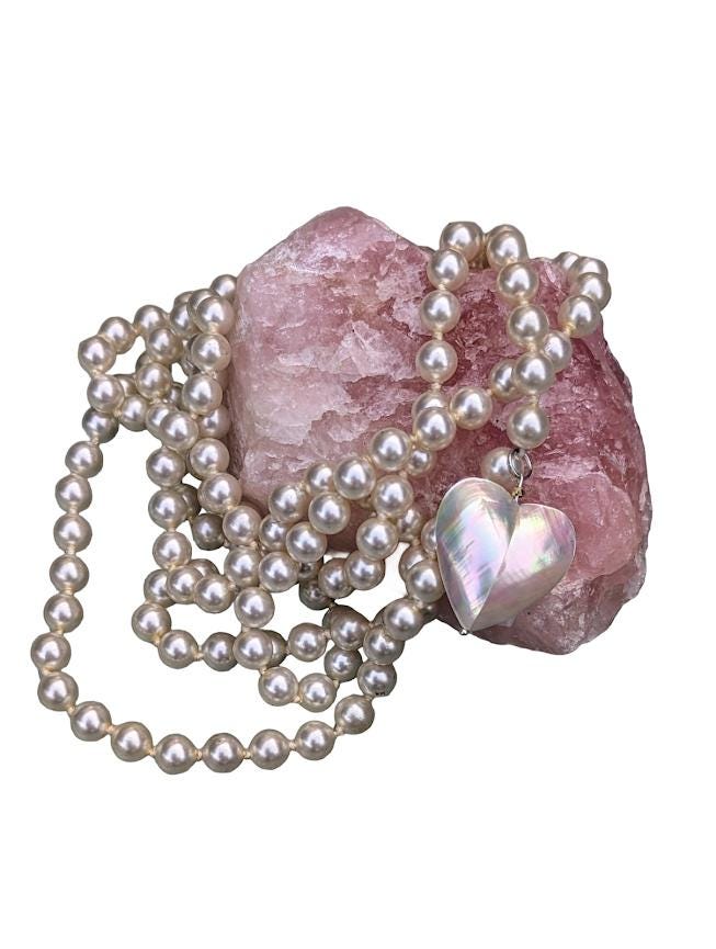 Pearl strand, bright white, 60 inches long, with a mother-of-pearl heart pendant, Decorative CZ closure. Can be wrapped one or two times