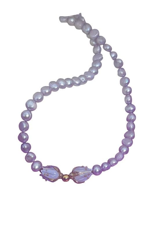 Violet Freshwater Pearl Choker with floral centerpiece.