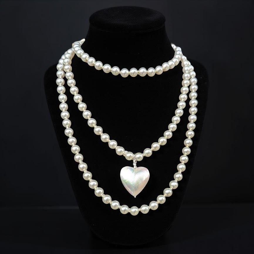 Pearl strand, bright white, 60 inches long, with a mother-of-pearl heart pendant, Decorative CZ closure. Can be wrapped one or two times