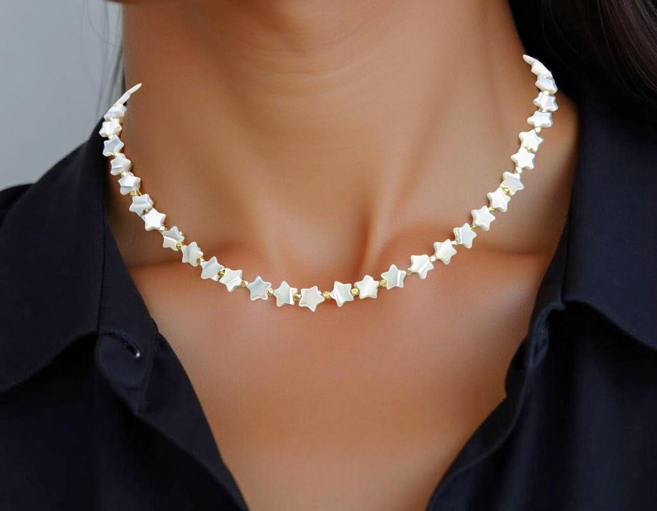 Mother-of-Pearl strand of stars. 18 inches in length. Great layering necklace