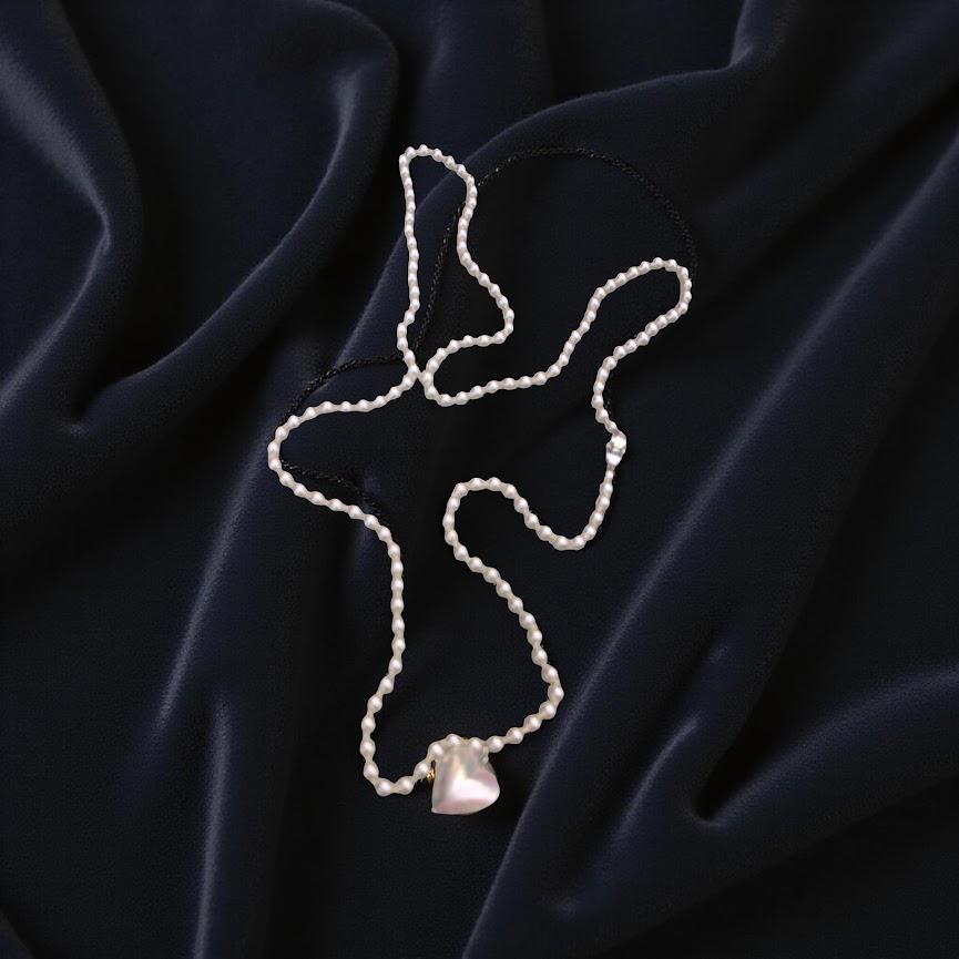 Pearl strand, bright white, 60 inches long, with a mother-of-pearl heart pendant, Decorative CZ closure. Can be wrapped one or two times