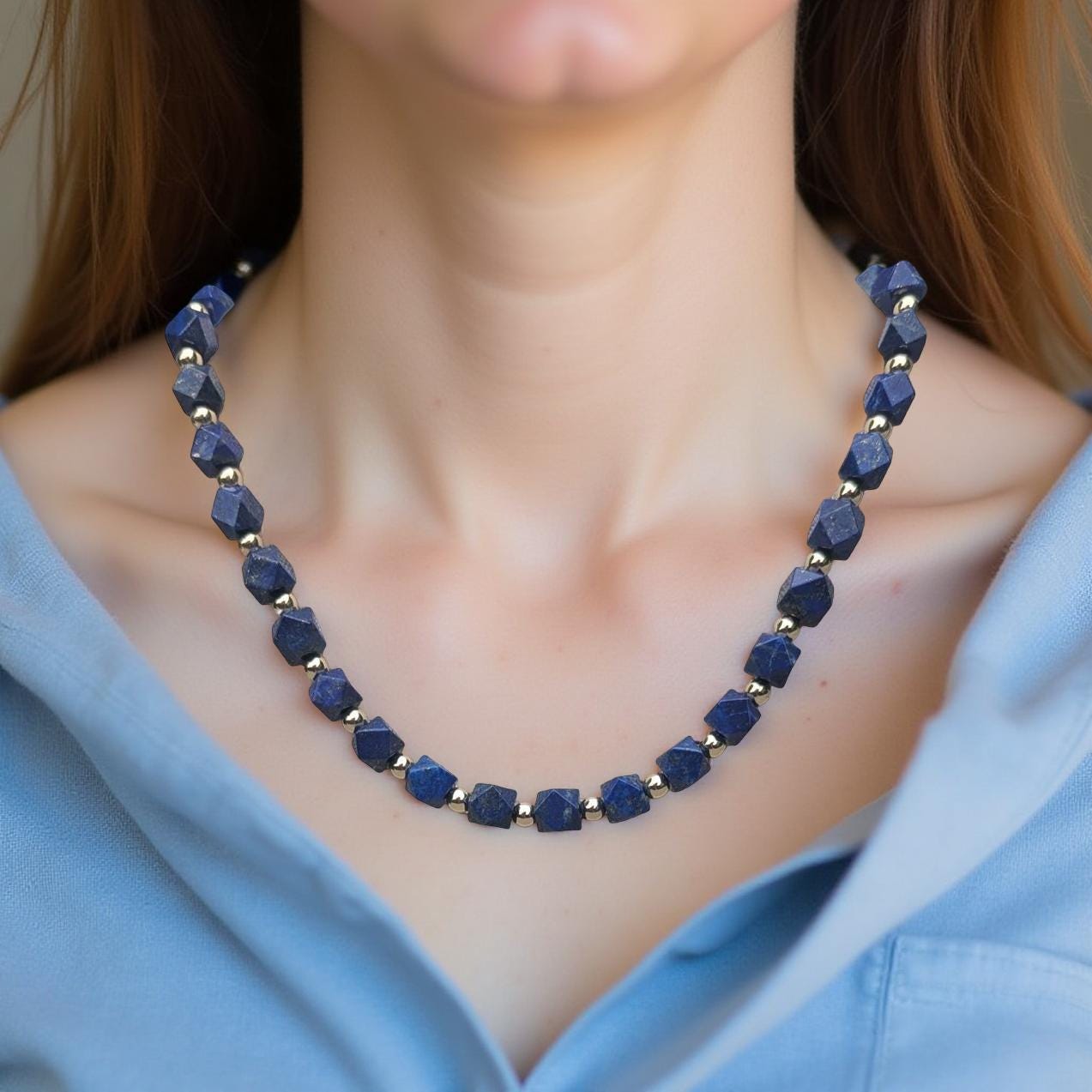 Lapis Lazuli Necklace. The square Lapis beads are faceted and interspersed with sparkling silver cubes. It's 21 inches in length.