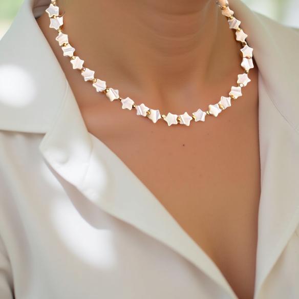 Mother-of-Pearl strand of stars. 18 inches in length. Great layering necklace