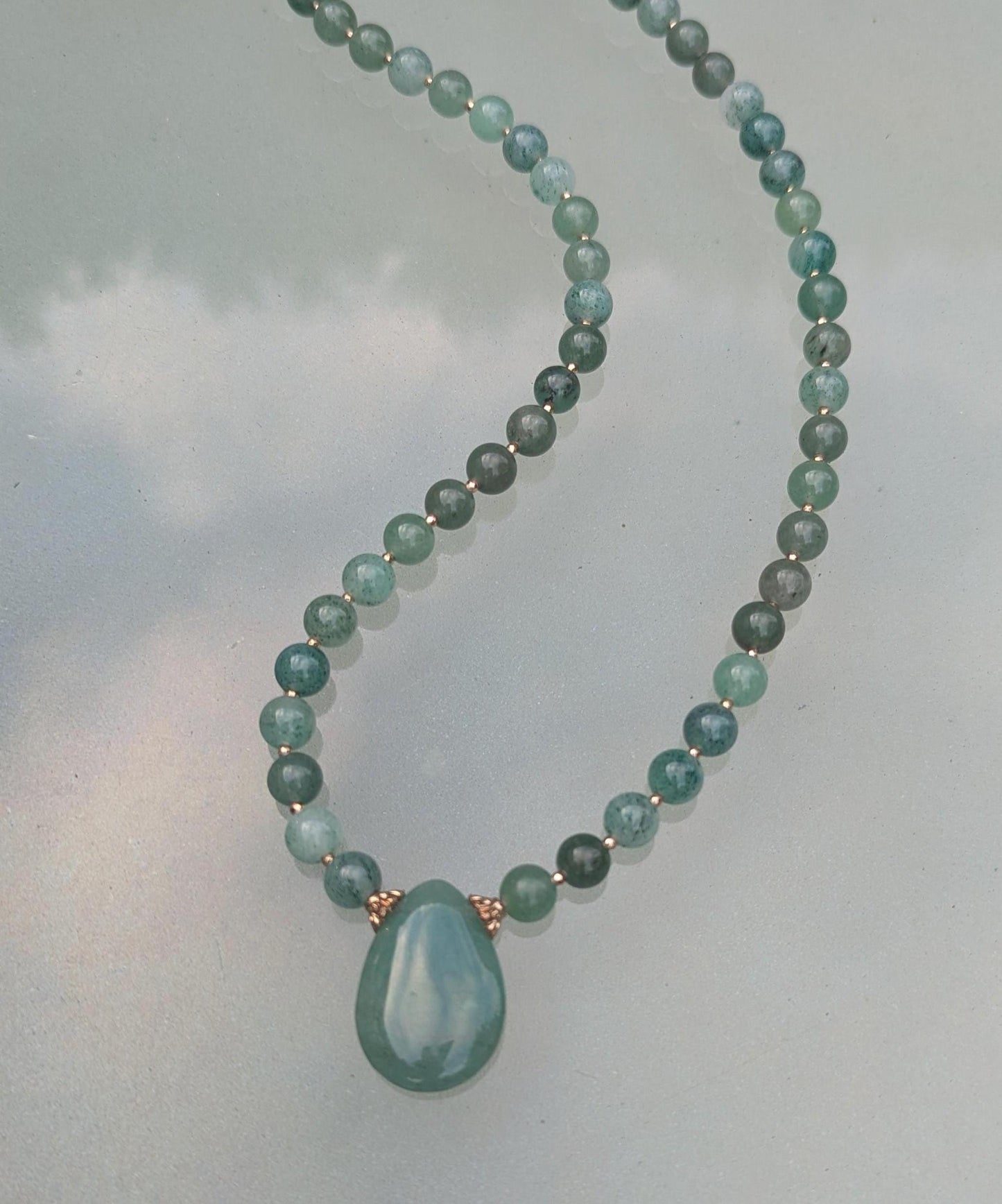 Jade Necklace, vibrant green rounded beads with a jade teardrop focal. A must-have for Jade lovers.