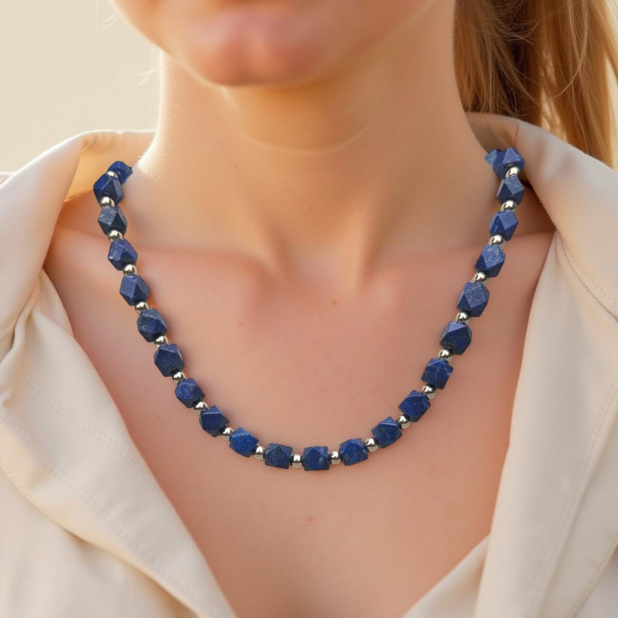 Lapis Lazuli Necklace.  The square Lapis beads are faceted and interspersed with sparkling silver cubes. It's 21 inches in length.
