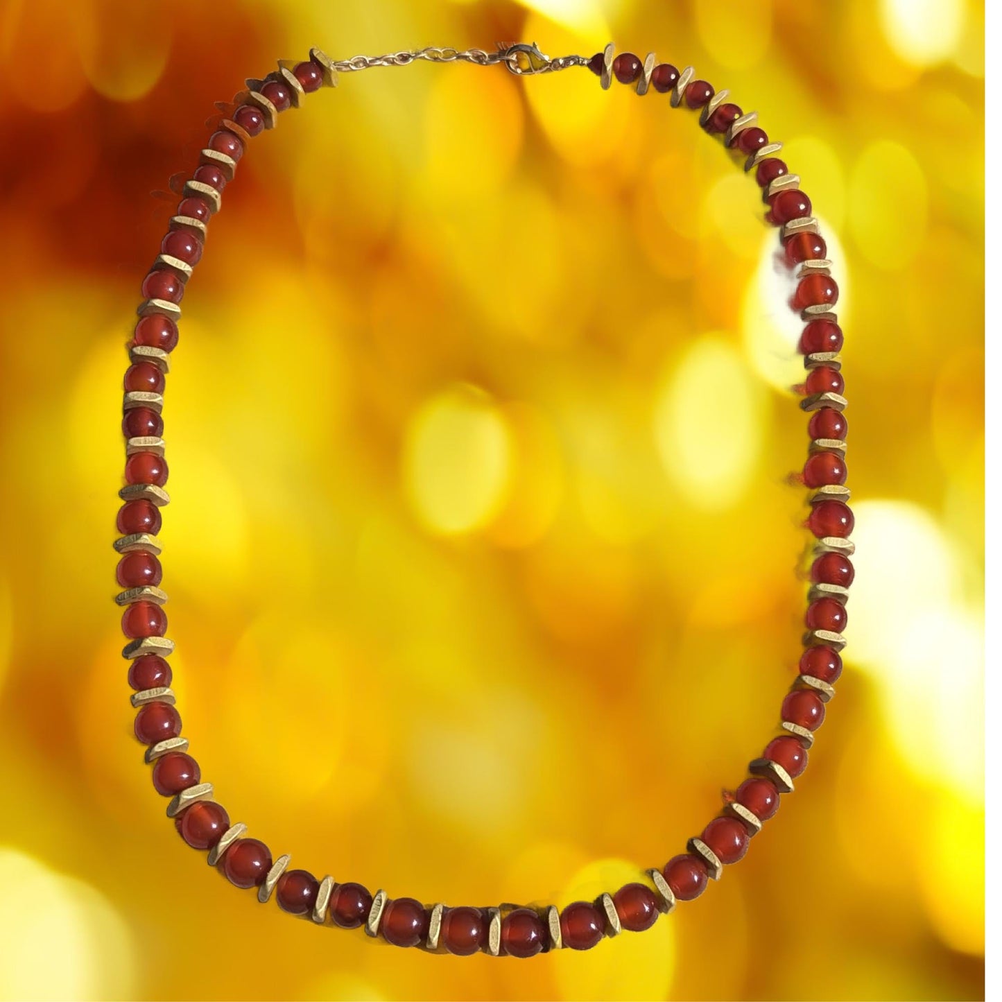 Carnelian beads surrounded by brushed gold squares