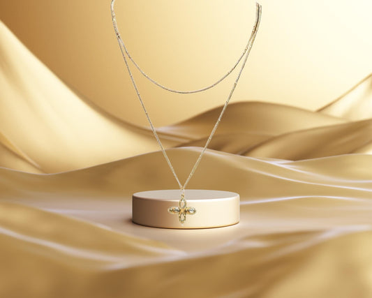 Delicate crystal pendant on a double chain. The crystal pendant is a translucent golden color.