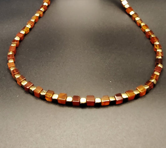 Carnelian square beaded necklace off set with gold plated squares.