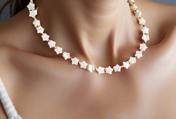 Mother-of-Pearl strand of stars. 18 inches in length. Great layering necklace