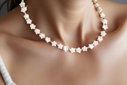 Mother-of-Pearl strand of stars. 18 inches in length. Great layering necklace