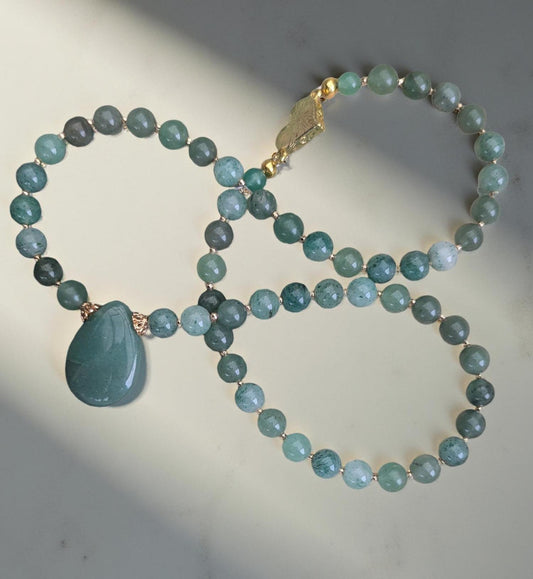 Jade Necklace, vibrant green rounded beads with a jade teardrop focal. A must-have for Jade lovers.