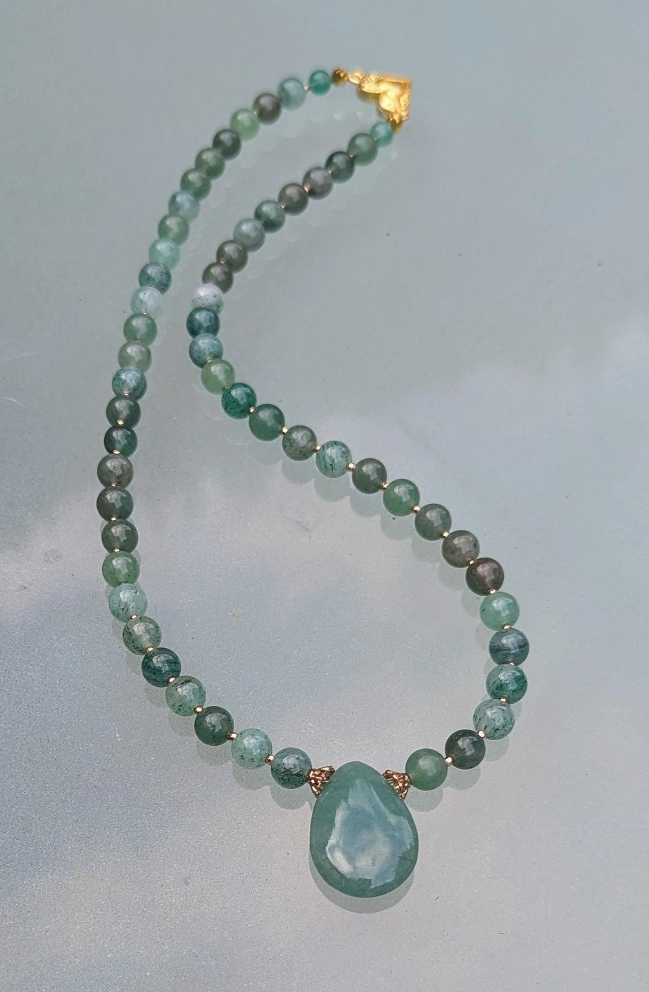 Jade Necklace, vibrant green rounded beads with a jade teardrop focal. A must-have for Jade lovers.