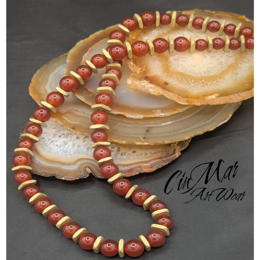 Carnelian beads surrounded by brushed gold squares