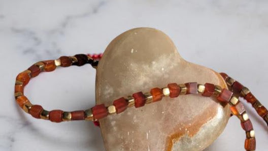 Carnelian square beaded necklace off set with gold plated squares.